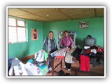 Sharing donated  clothing - Chaupiloma, June 13, 2019