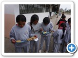 Kids reading gospel pamphlets in Santa Monica (29 Nov 2019)