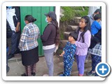 Neighbors waiting to pick up supplies