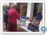 Nancy managing the clothing table