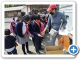 Children receive snacks at Arturo Borja school - Muyurco 28 NOV 2022