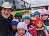 James and Jakelin gave woll caps to kids at Patricia Brown school at Santa Monica - June 4, 2023