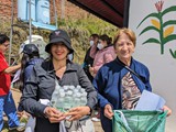 Jaqueline and Lucia serving at Nino Emanuel school at Chaupiloma - June 5, 2023