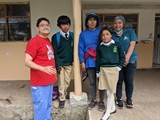 Dino shared the gospel with this family at Chaupiloma day care - June 5, 2023